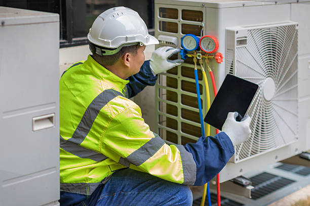 Professional Heat Pump Repair technician working in Dana, IN